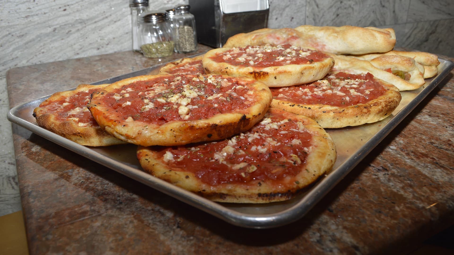 Fresh handmade personal pizzas